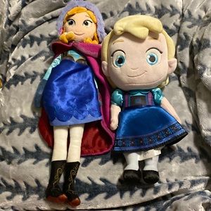 Anna and Elsa doll plushies.